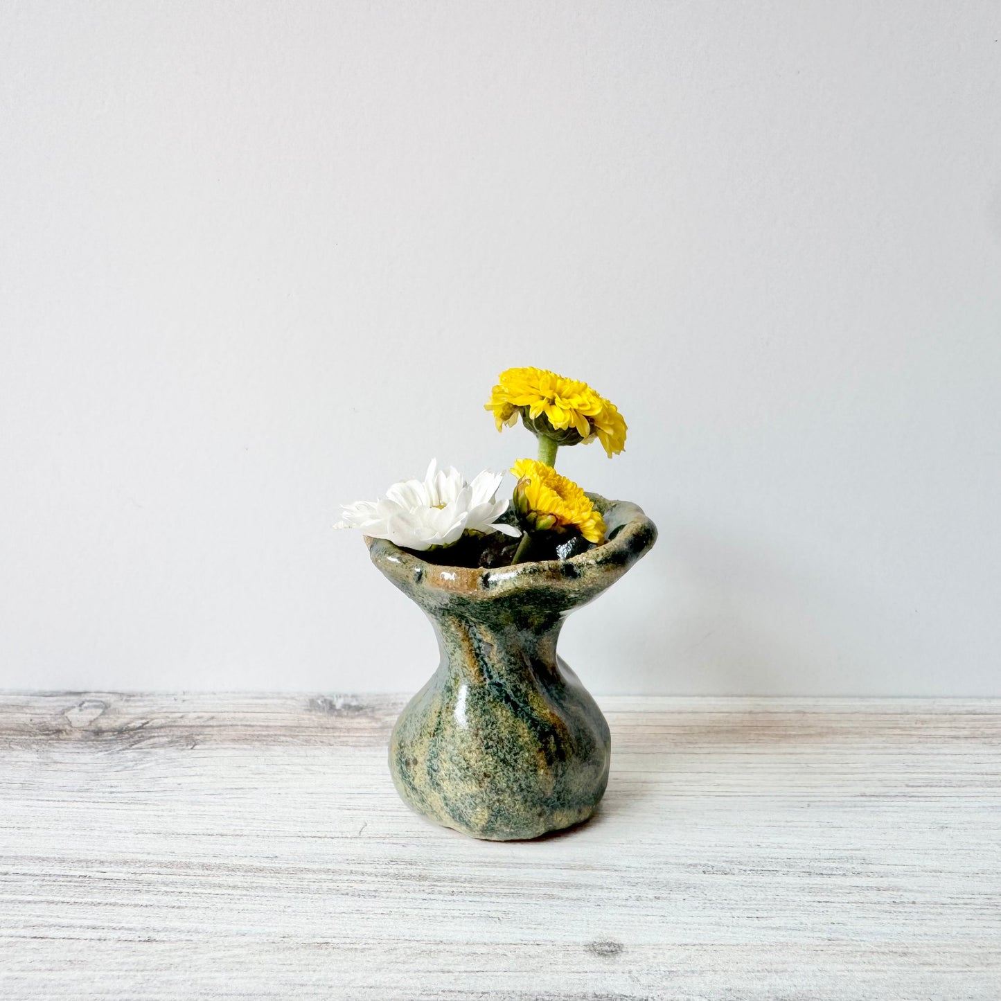 Mini vase, antique blue on brown clay