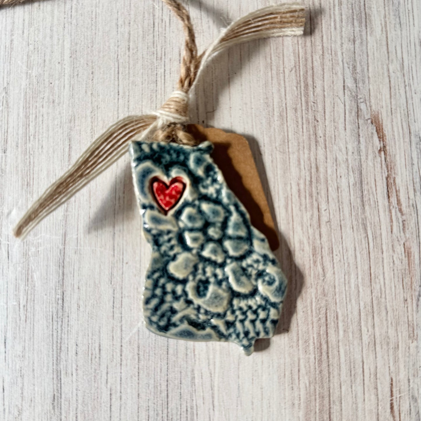 GA with a heart ornament, antique blue