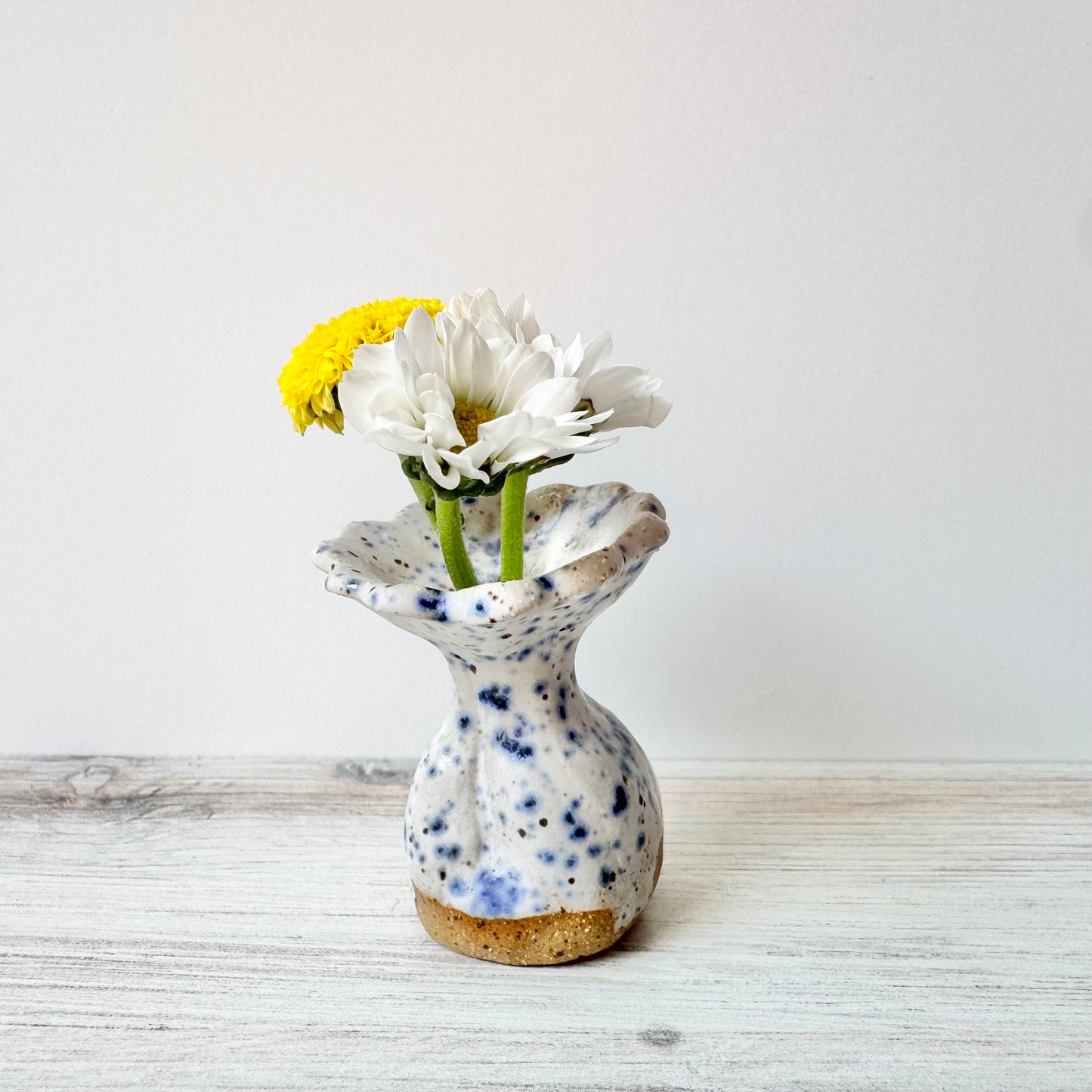Mini vase, blue splatterware