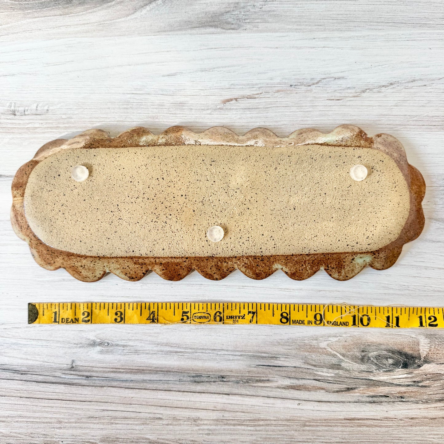 Oblong scalloped platter, mint green on brown clay
