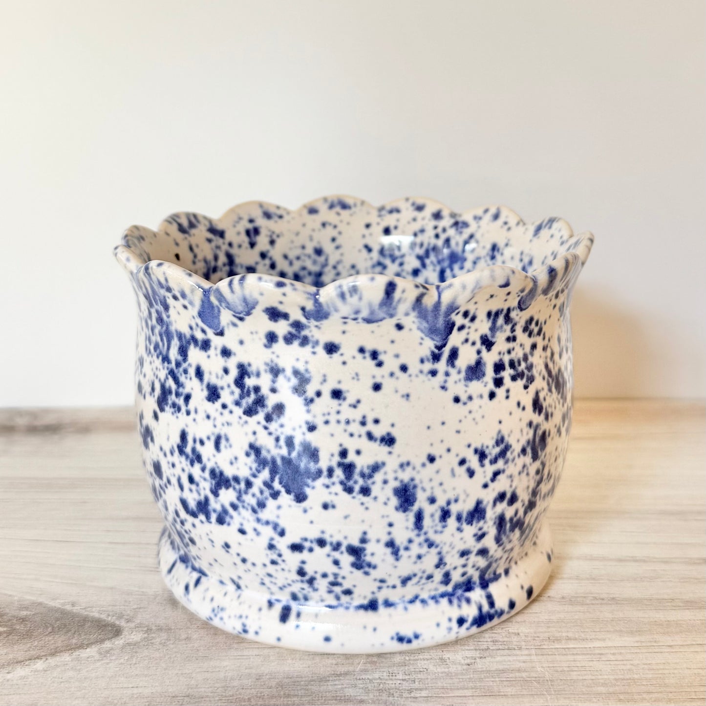 Violet pot, scalloped, blue splatterware