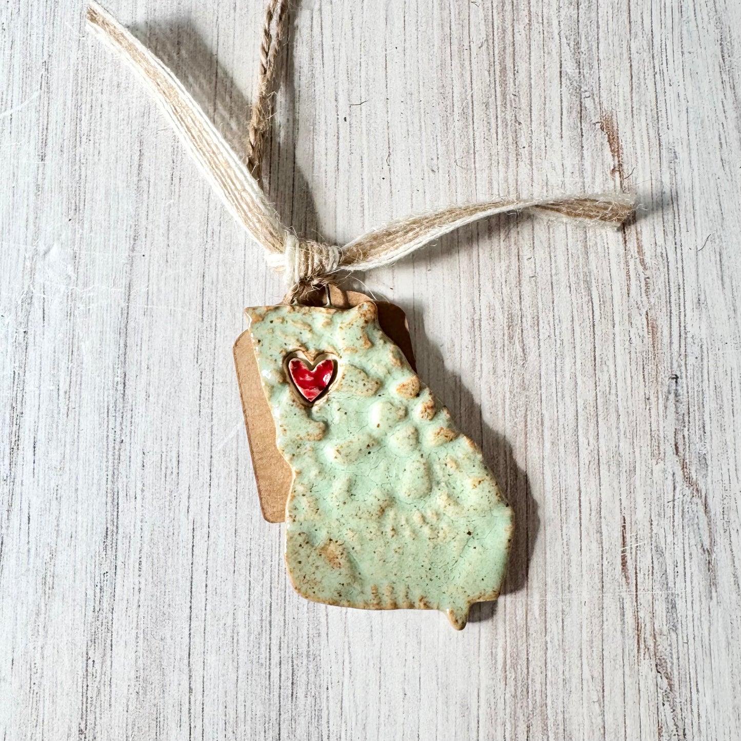 GA with a heart ornament, mint green
