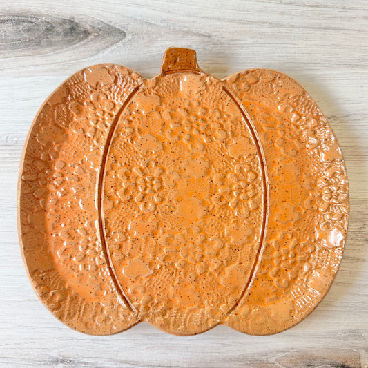 Pumpkin platter, orange on brown clay