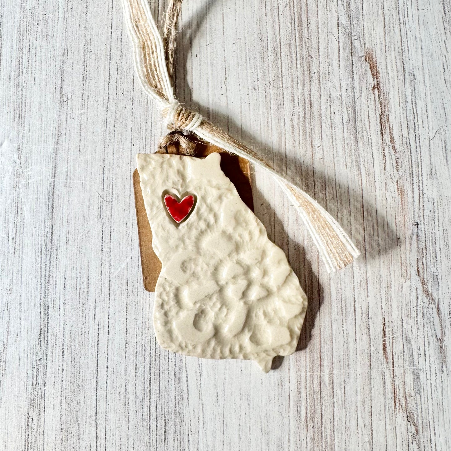 GA with a heart ornament,