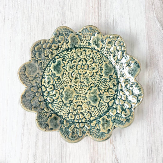 Round scallop spoon rest, antique blue on brown clay